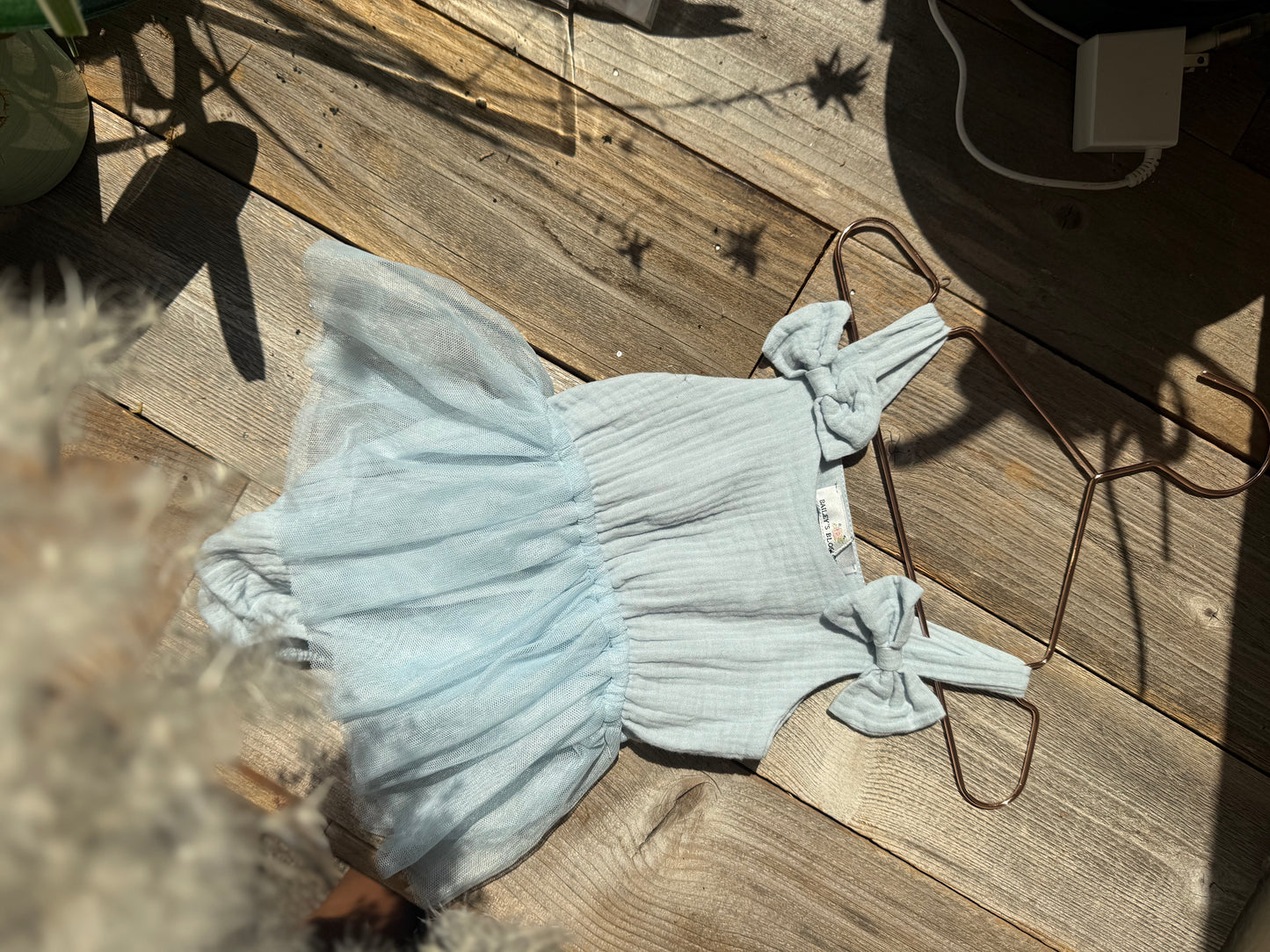 BLUE SKIES BABY ONESIE